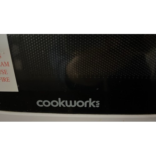 219 - COOKWORKS MICROWAVE OVEN IN WHITE