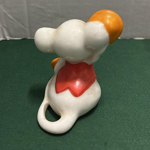 61 - FOUR MOUSE FIGURES