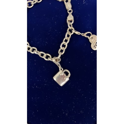 175 - 925 SILVER CHARM BRACELET