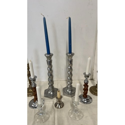 74 - FOUR PAIRS OF CANDLE STICKS