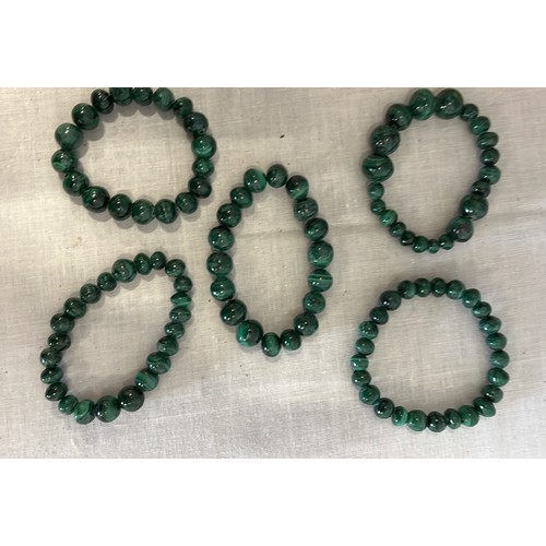 266 - FIVE MALACHITE BRACELETS