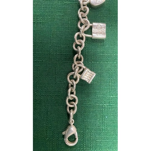 107 - TIFFANY & CO 925 SILVER CHARM BRACELET 34g