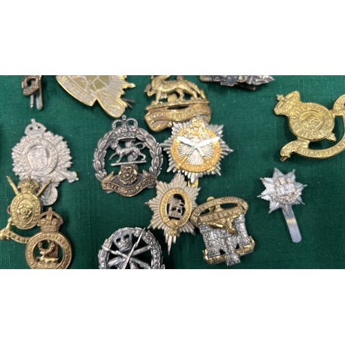 42 - WWI & WWII CAP BADGES