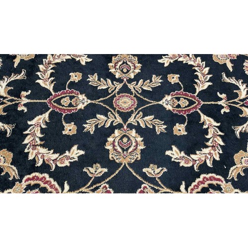 565 - LARGE BLACK OVER FLOOR RUG 7 X 4 ft