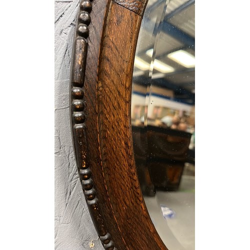 102 - 1920s OAK OVAL WALL MIRROR