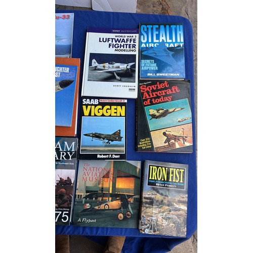 64 - LARGE SELECTION OF MILITARY THEMED BOOKS