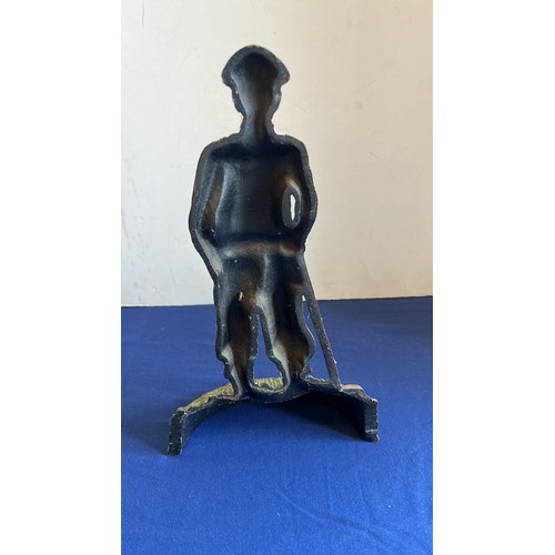 59 - LARGE CAST METAL GOLFER DOOR STOP...