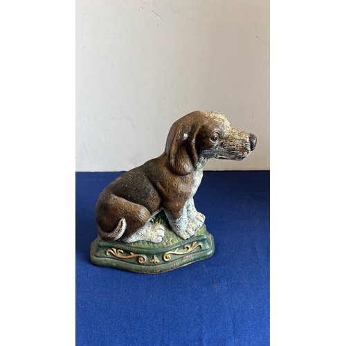55 - CAST METAL DOG DOOR STOP...