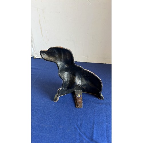 55 - CAST METAL DOG DOOR STOP...