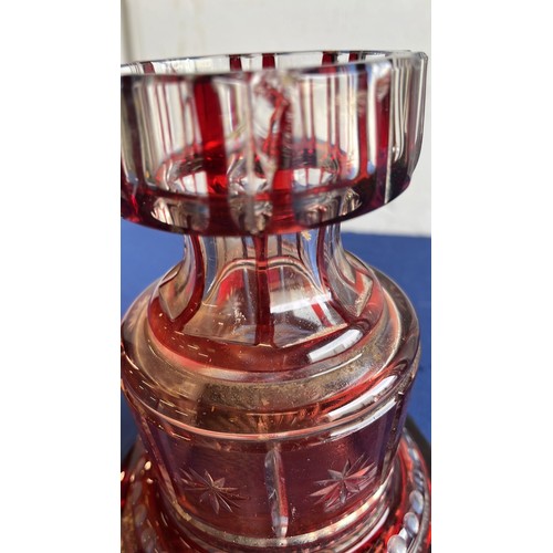 49 - EDWARDIAN RED GLASS TABLE VASE...