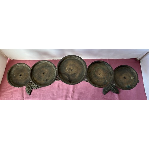 23 - CAST METAL CANDLE STAND...