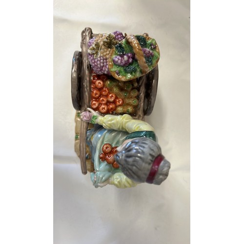 9 - FEMALE FRUIT SELLER