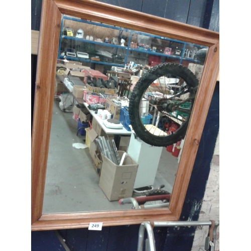 249 - 2 x large wooden framed wall mirrors approx. 75 x 60 and 89 x 63cm