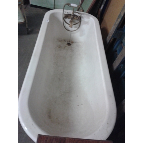 403 - Vintage 6 foot cast iron bath with ball and claw feet and original tap fittings