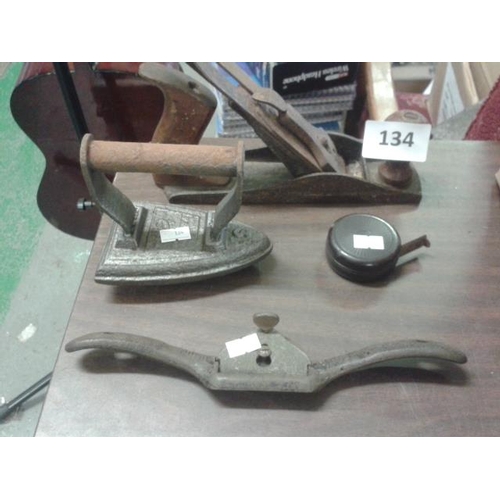 134 - Vintage carpenters plane, spokeshave, metal iron and bakelite tape measure