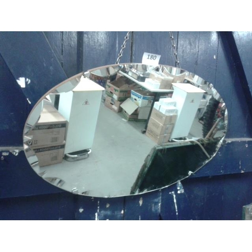 180 - Large oval frameless wall mirror, approx. 675 x 400mm