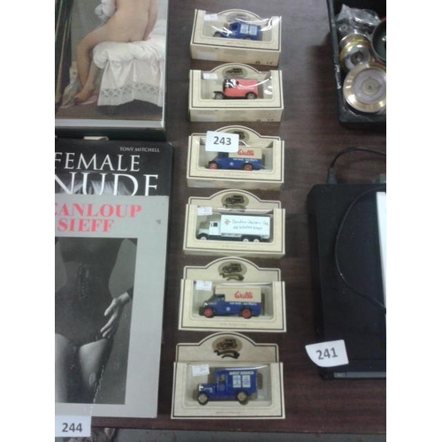 243 - 6 x boxed Lledo promotional vehicle die cast vans, 2 x Daily Herald, 2 x Walls, operation Christmas ... 