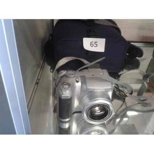 65 - Fuji Finepix digital camera with carry bag