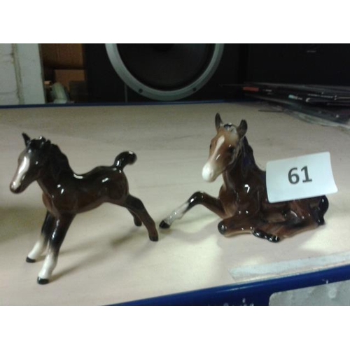 61 - Beswick model 815 foal lying down & 997 foal facing left with white blaze