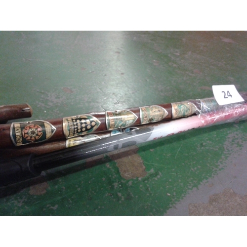 24 - 2 x modern carbon & 2 x old wooden walking sticks. Wooden sticks have stick badges and one with bull... 