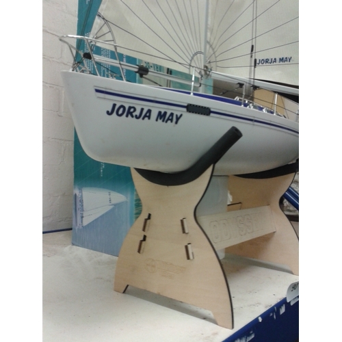 90 - Thunder Tiger odyssey 1/23 scale racing yacht on stand, signed up Jorga May Rhyl. Original box prese... 