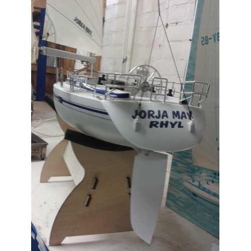 90 - Thunder Tiger odyssey 1/23 scale racing yacht on stand, signed up Jorga May Rhyl. Original box prese... 