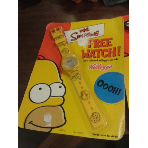 144 - 2 x 2002 collectible Simpsons watches