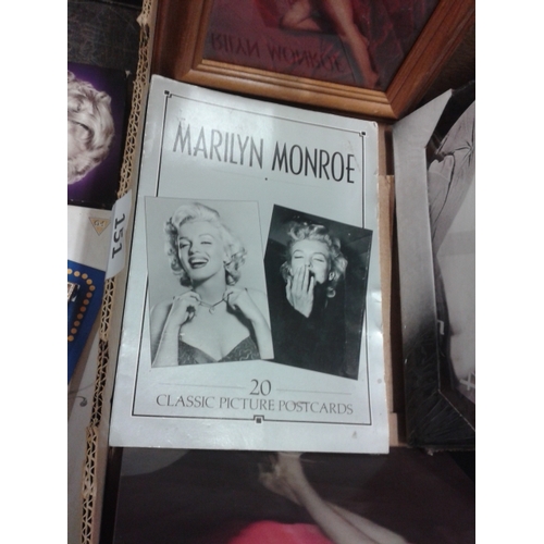 151 - Marilyn Monroe job lot to include pictures, books and DVD sets