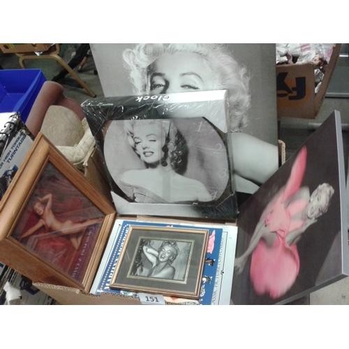 151 - Marilyn Monroe job lot to include pictures, books and DVD sets