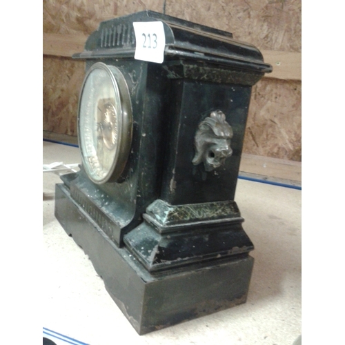 213 - Victorian Ansonia Clock Company, black enamelled iron mechanical clock with spelter lion sides