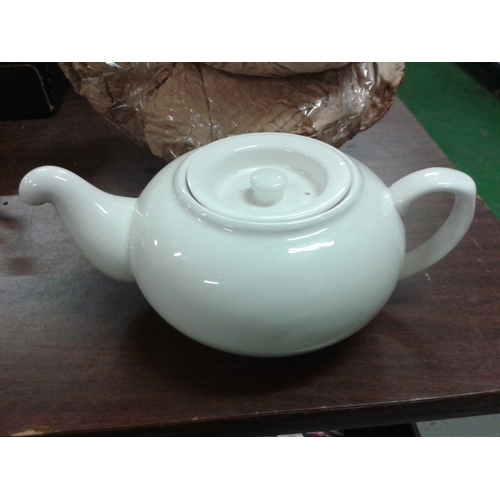 241 - 7 x white catering teapots