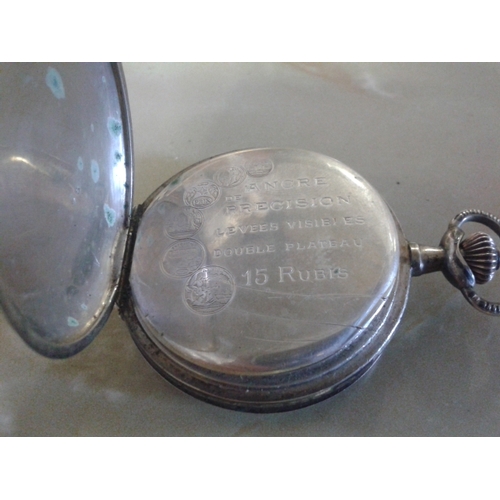 44 - Vintage Iko white metal 15 jewel pocket watch, working order but hour hand missing. 1 side with etch... 