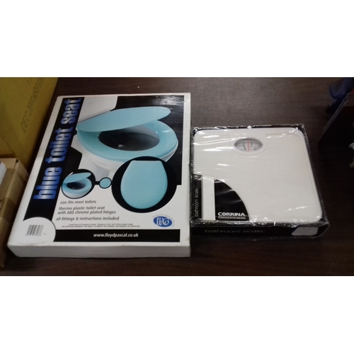 176 - New and boxed blue plastic toilet seat & new and boxed bathroom scales