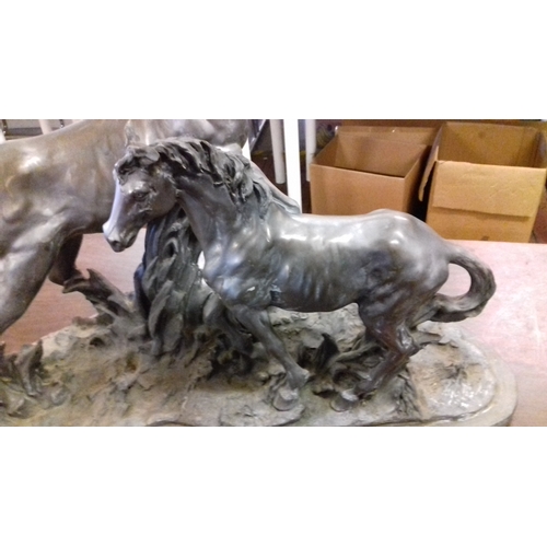 163 - Large silver coloured composite galloping mare and foal ornament, approx 2ft x 1ft x 50cm tall