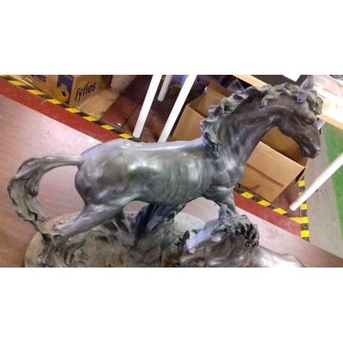 163 - Large silver coloured composite galloping mare and foal ornament, approx 2ft x 1ft x 50cm tall