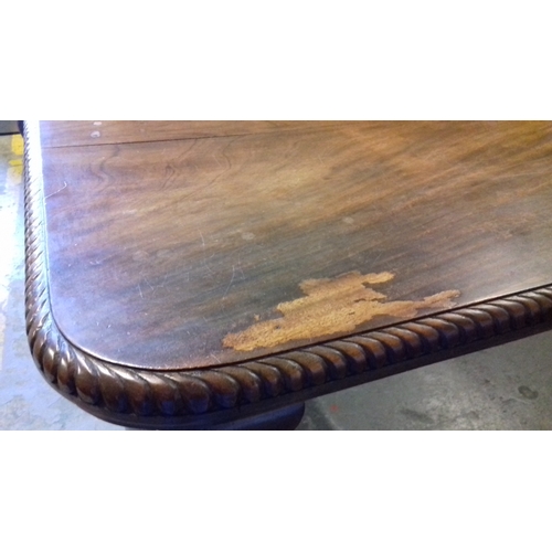 435 - Curved corner edwardian dining table on castors, approx 132 x 106cm