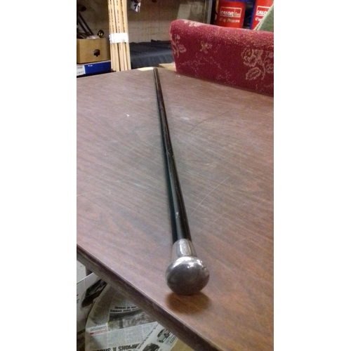 80 - Ebony walking cane with hallmarked silver top