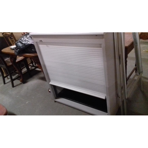 441 - Grey roller shutter stationery cabinet approx 95 x 57 x 112 cm tall. Lockable with key but one key b... 