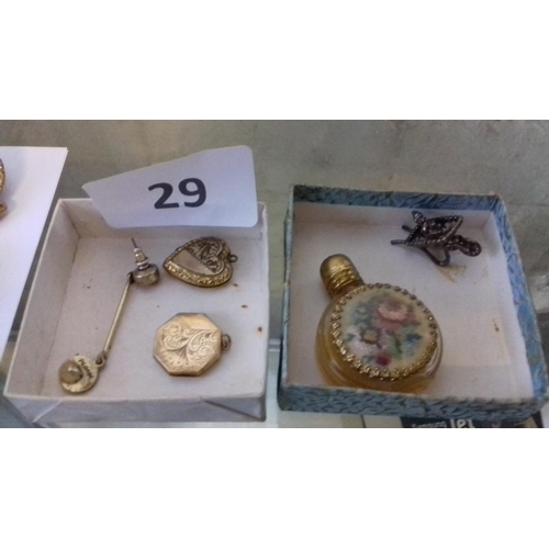 29 - 2 x 9 carat back and front lockets, vintage scent bottle, white metal wheelbarrow charm and other pi... 