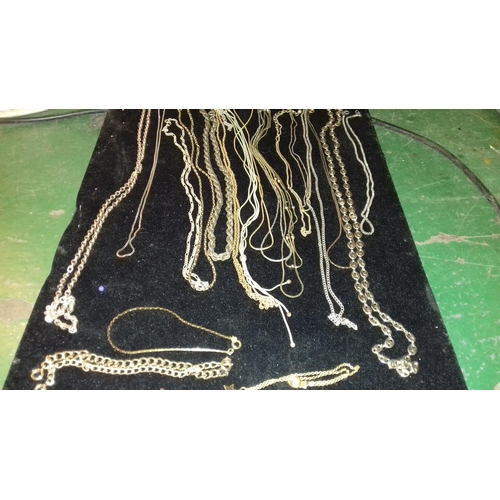 35 - Quantity of assorted gold-coloured necklaces and bracelets