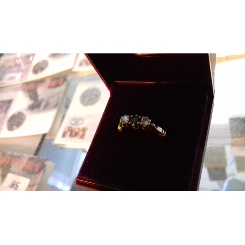 51 - 750 stamped London hallmark 18 carat gold emerald with double diamond trilogy ring size m 1/2