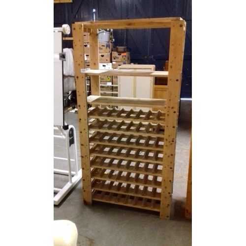 322 - Single wooden shelving rack with wine storage section approx. 89cm wide