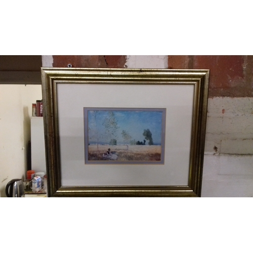 22B - Framed and mounted Claude Monet picture titled woman reading approx. 30 x 25cm