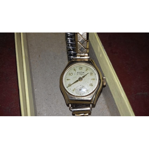 38 - 375 stamped ladies avia 15 jewel wrist watch in working order but heavily scratched glass front on e... 