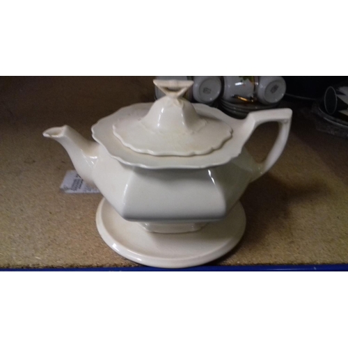 88 - Maddock and son royal ivory minerva teapot & swinnertons teapot stand