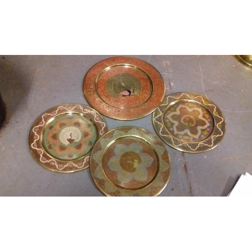 319 - 1 x 25 cm & 3 x 20 cm peacock decorated brass wall plates