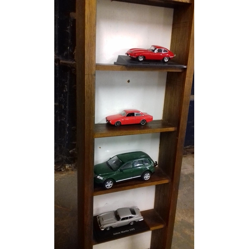 7 - 8 section wooden wall mount display stand for model cars etc with assorted matchbox and corgi vehicl... 