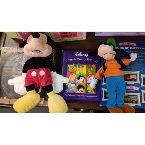 337 - 2 x medium size disney soft toys, mickey mouse and goofy & disney ultimate family treasures book