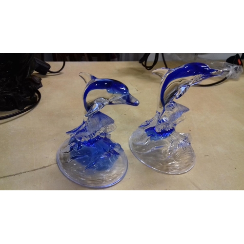 102 - 2 x blue glass dolphin ornaments