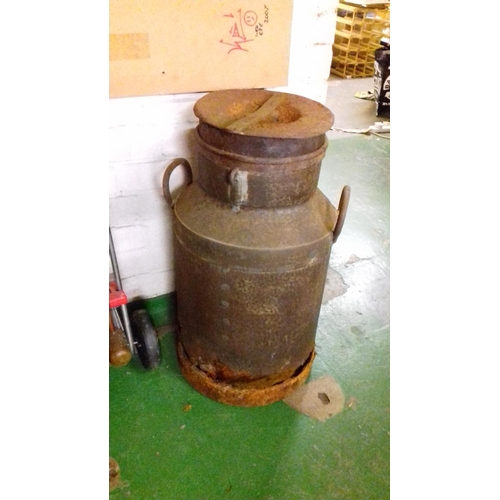 59 - Early steel milk churn,rusty with hole